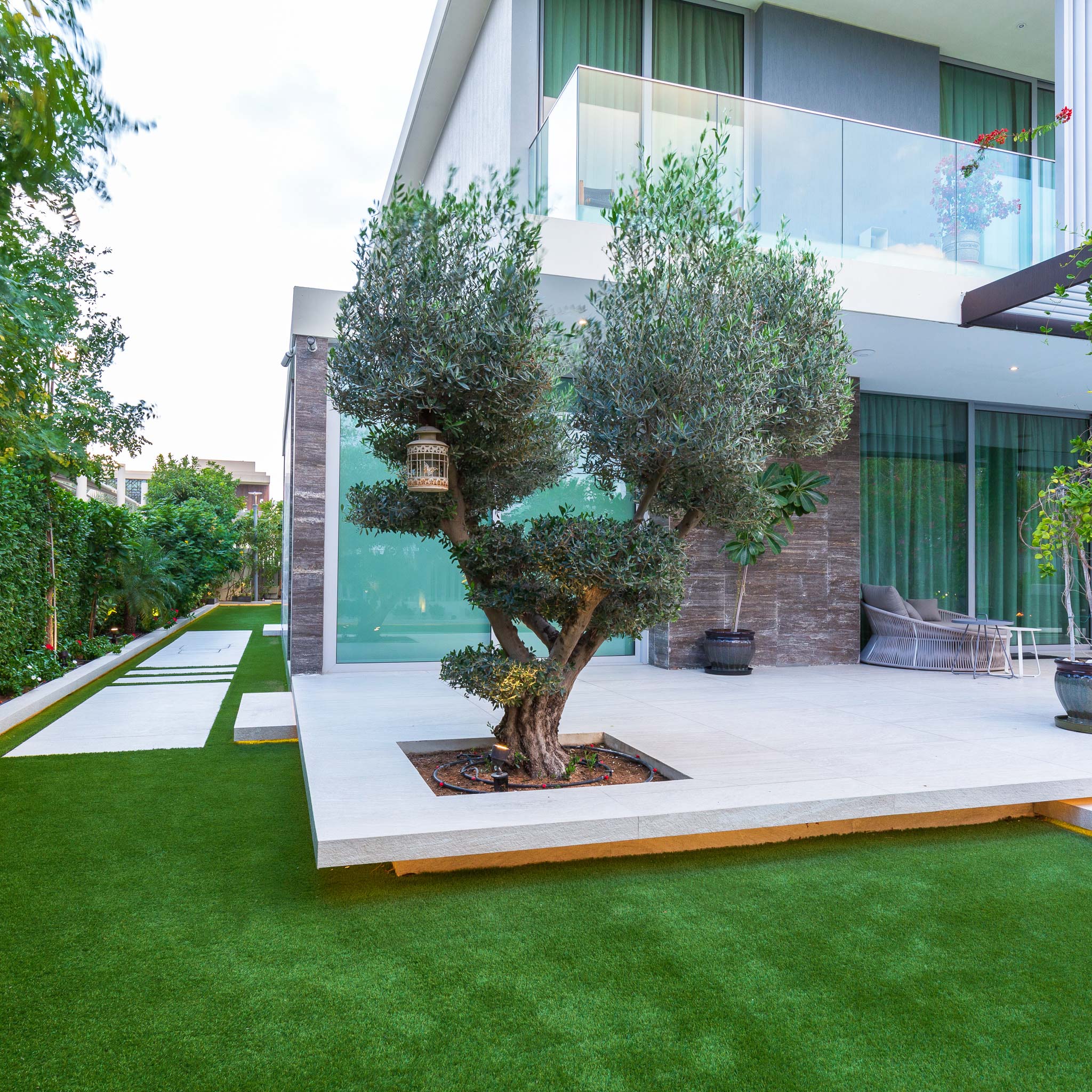 Heat-tolerant planting in a Dubai villa garden