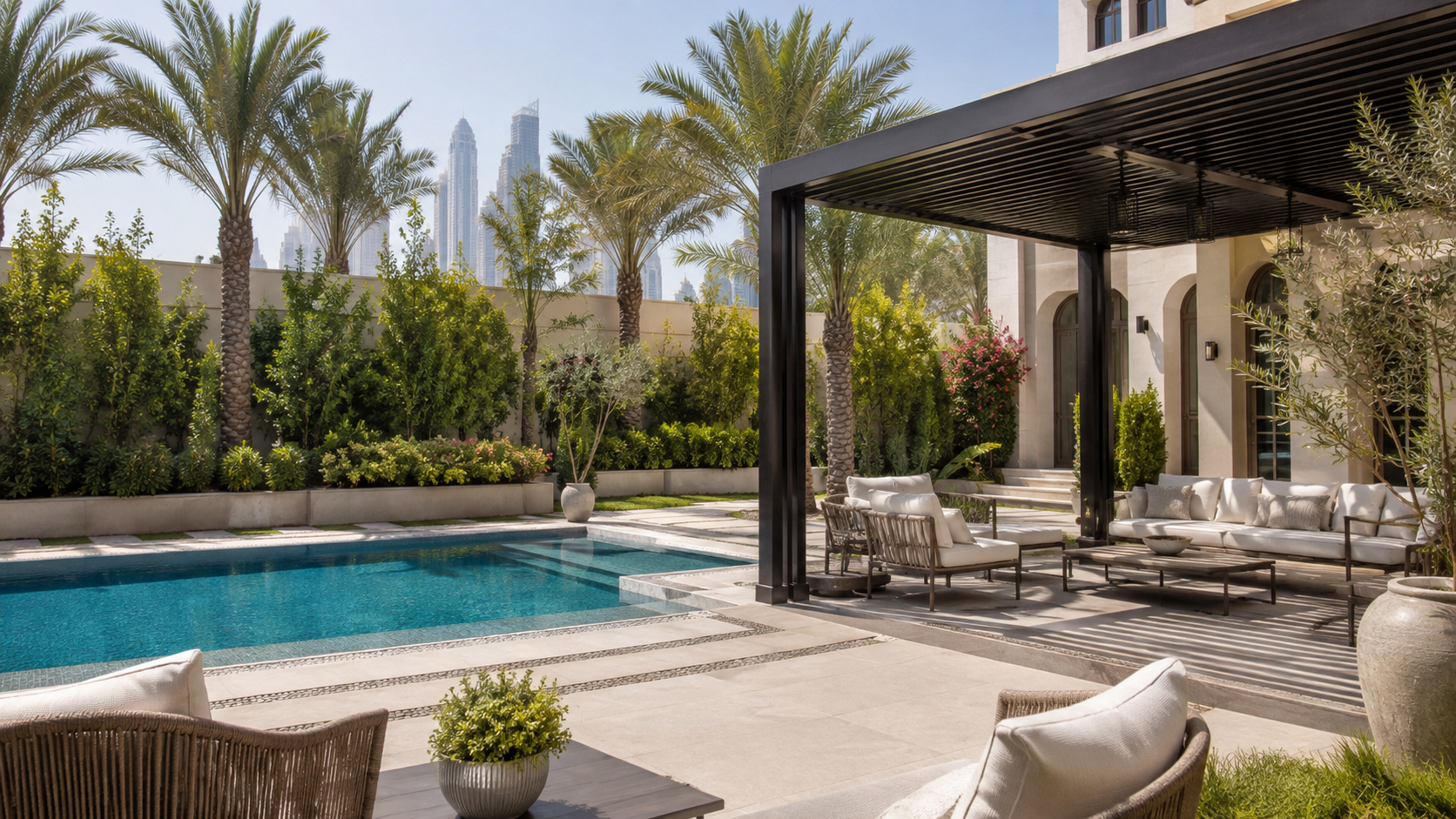 Private villa pool landscaping in Dubai with pergola, tall palms, shaded seating and outdoor privacy plants