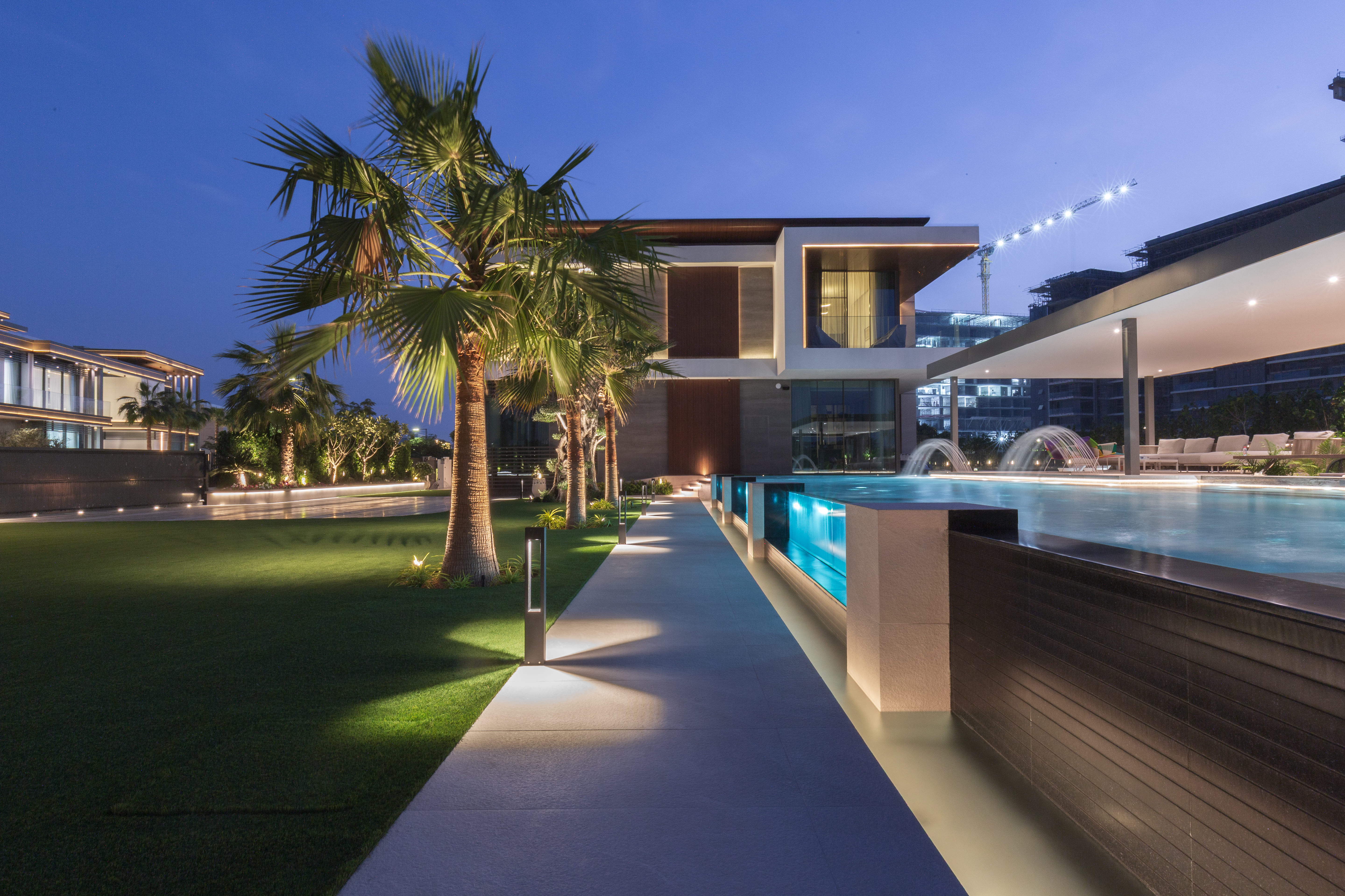 Night view of the pool and pavilion