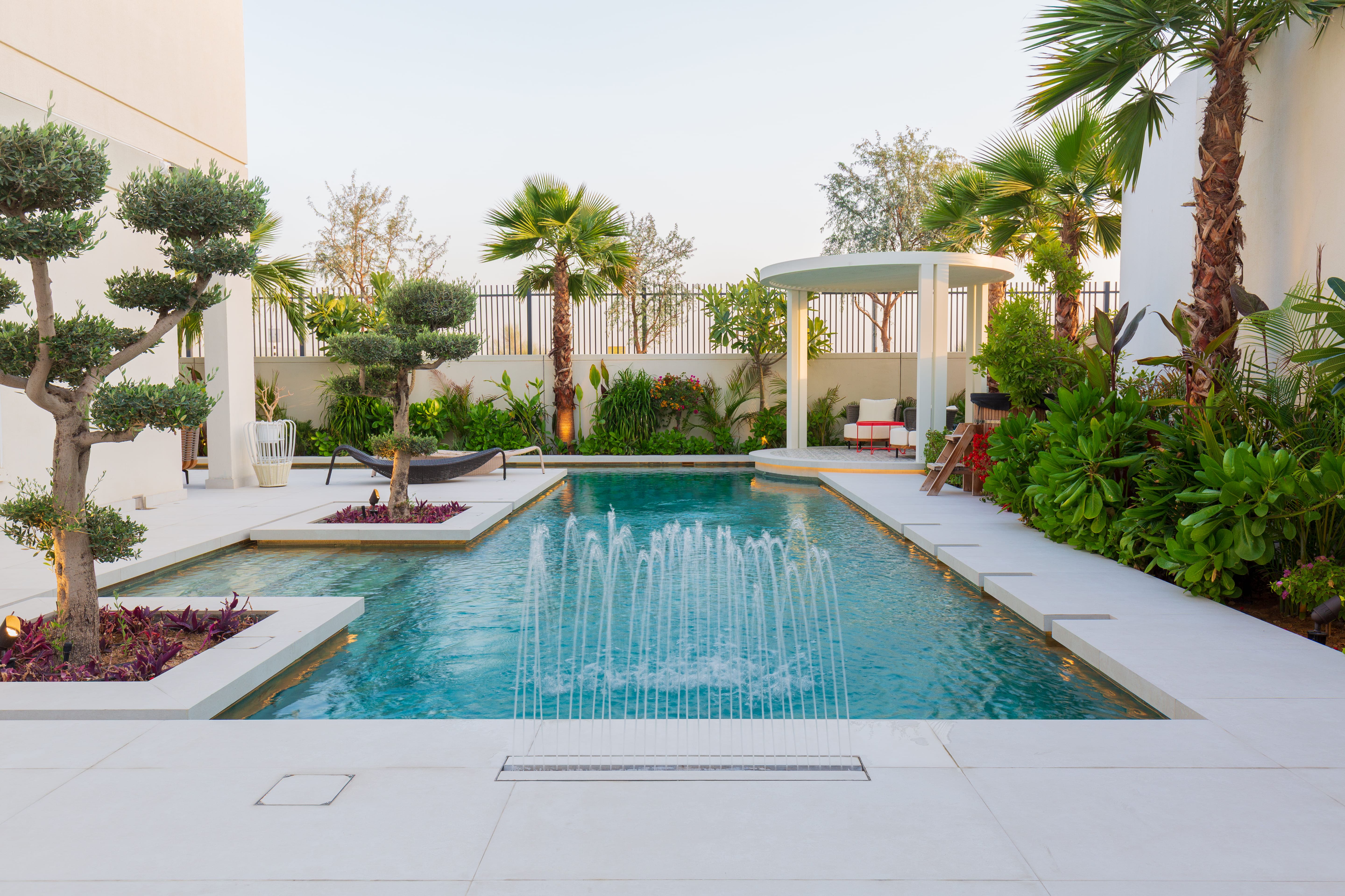 Daytime view of the swimming pool and garden pavilion